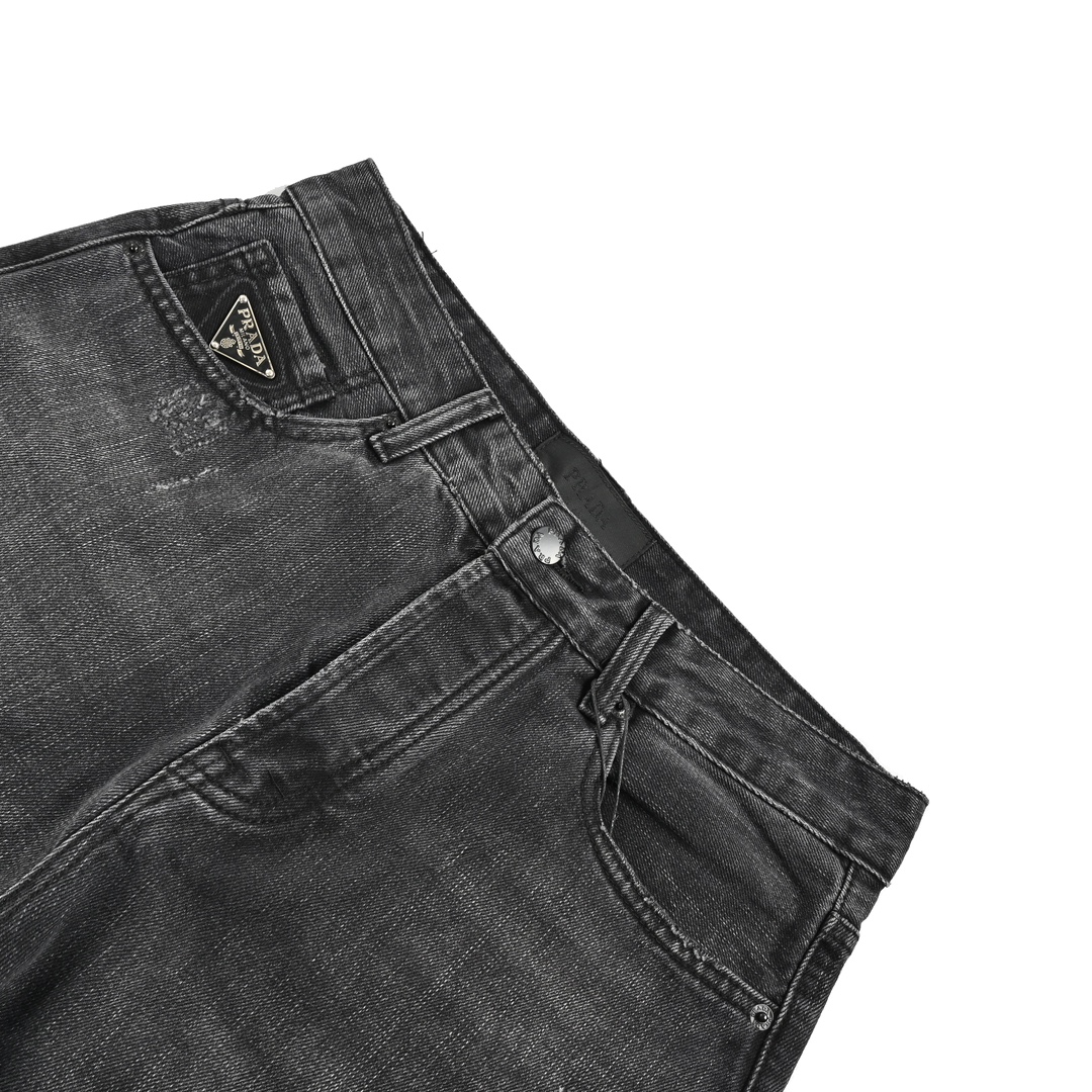 Prada 23Fw washed jeans with triangle logo embroidery