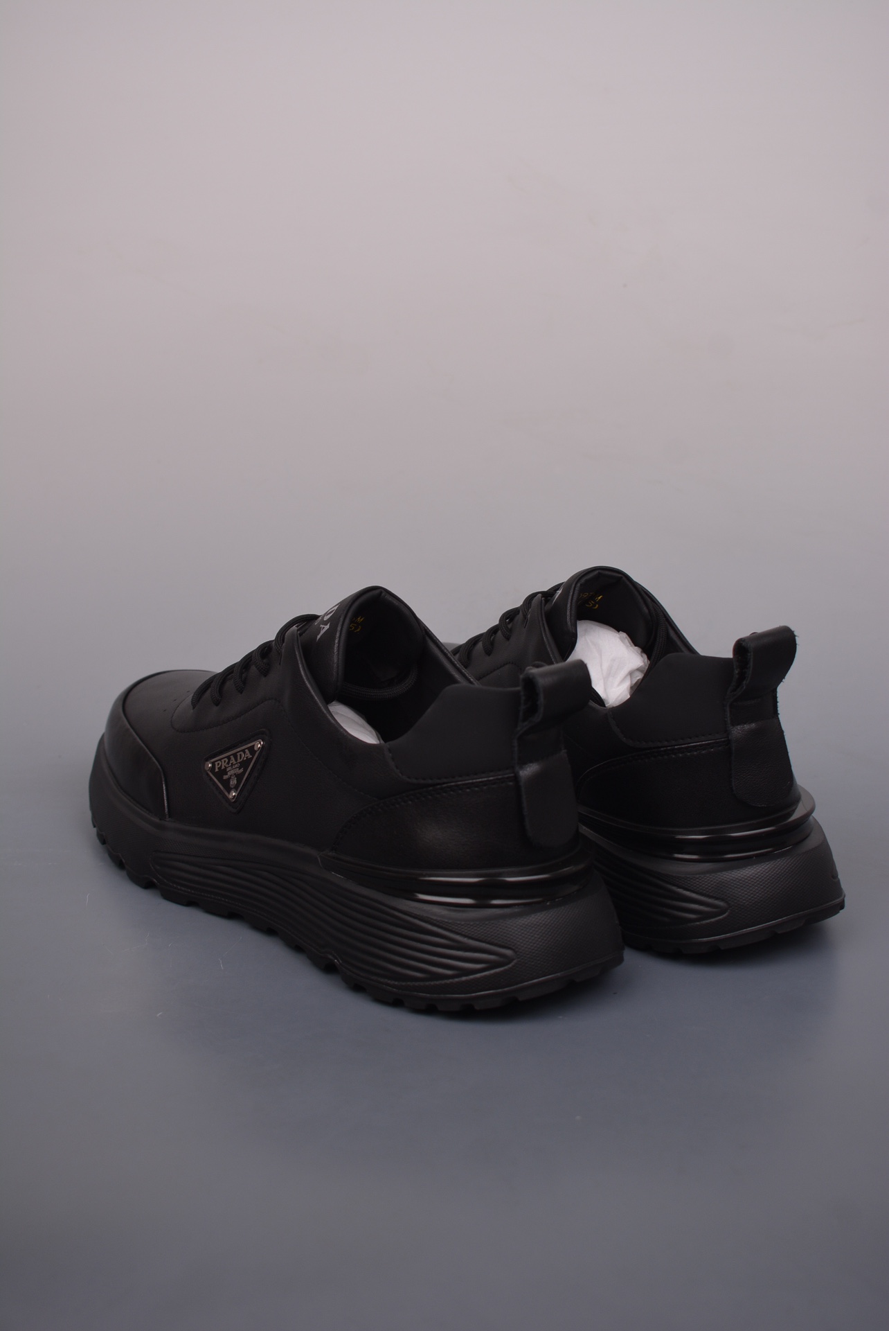 Prada PRAX 01 Triangle Logo Leather Sneakers glossy black 3D936M_3LF5_FG00