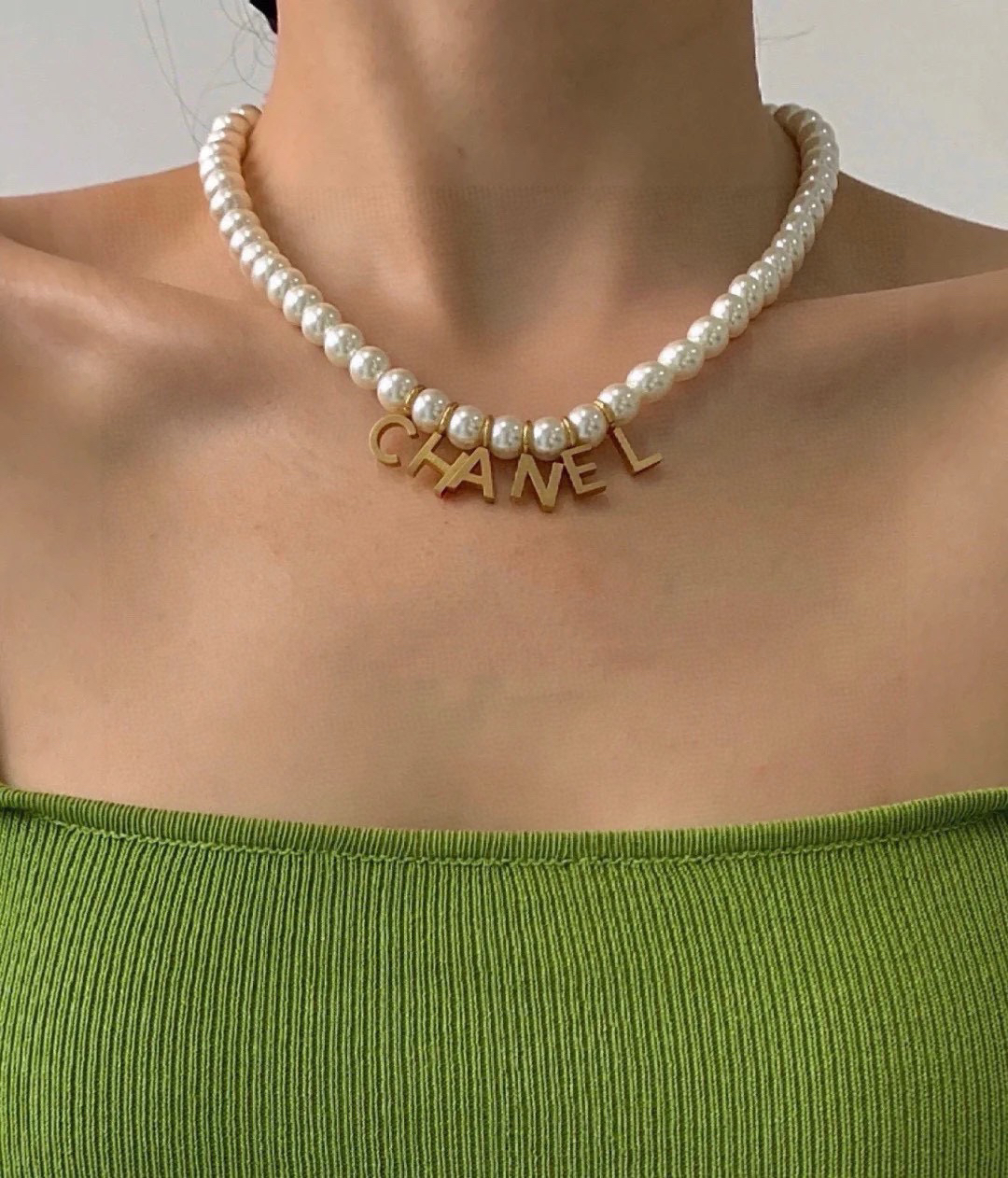 Chanel alphabet pearl necklace