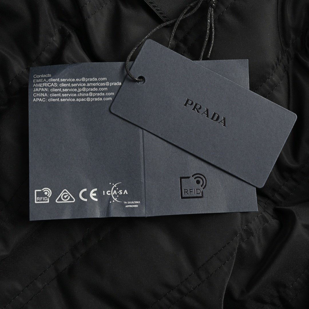 Prada 24Fw baseball jacket with P patch and medal on chest