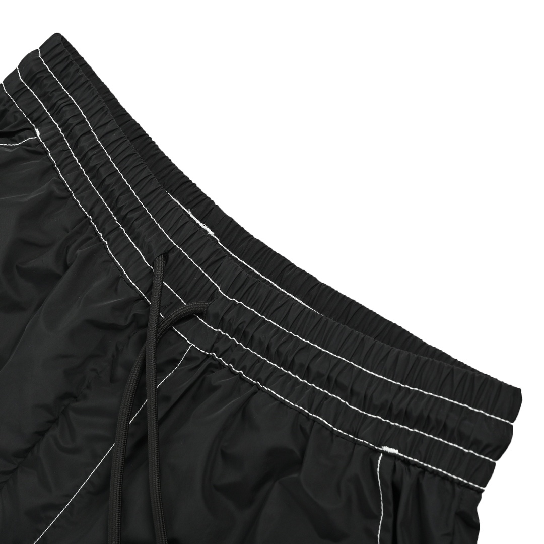 Prada 23ss nylon shorts with exposed triangle logo