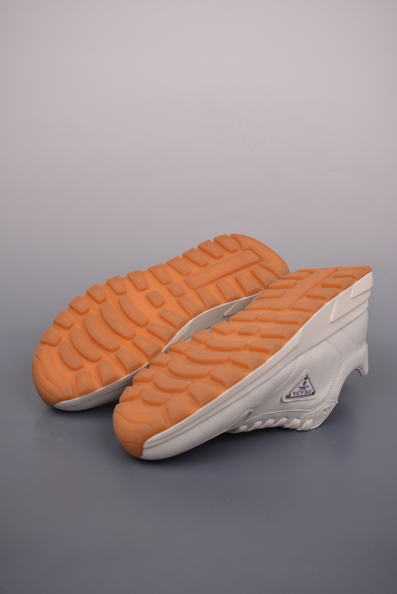 Prada PRAX 01 Triangle Logo Leather Sneakers off-white 3D936M_3LF5_FG000