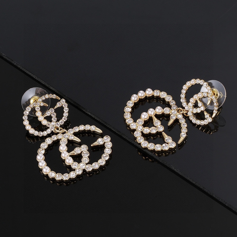 GUCCi pearl and diamond earrings