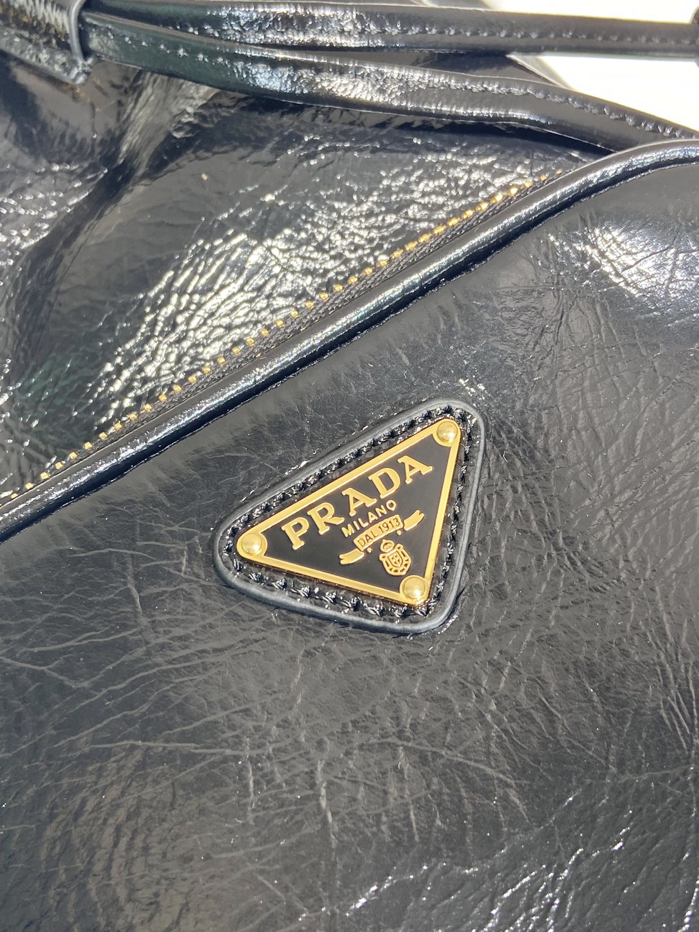 Prada waxed leather bucket bag 1BH038