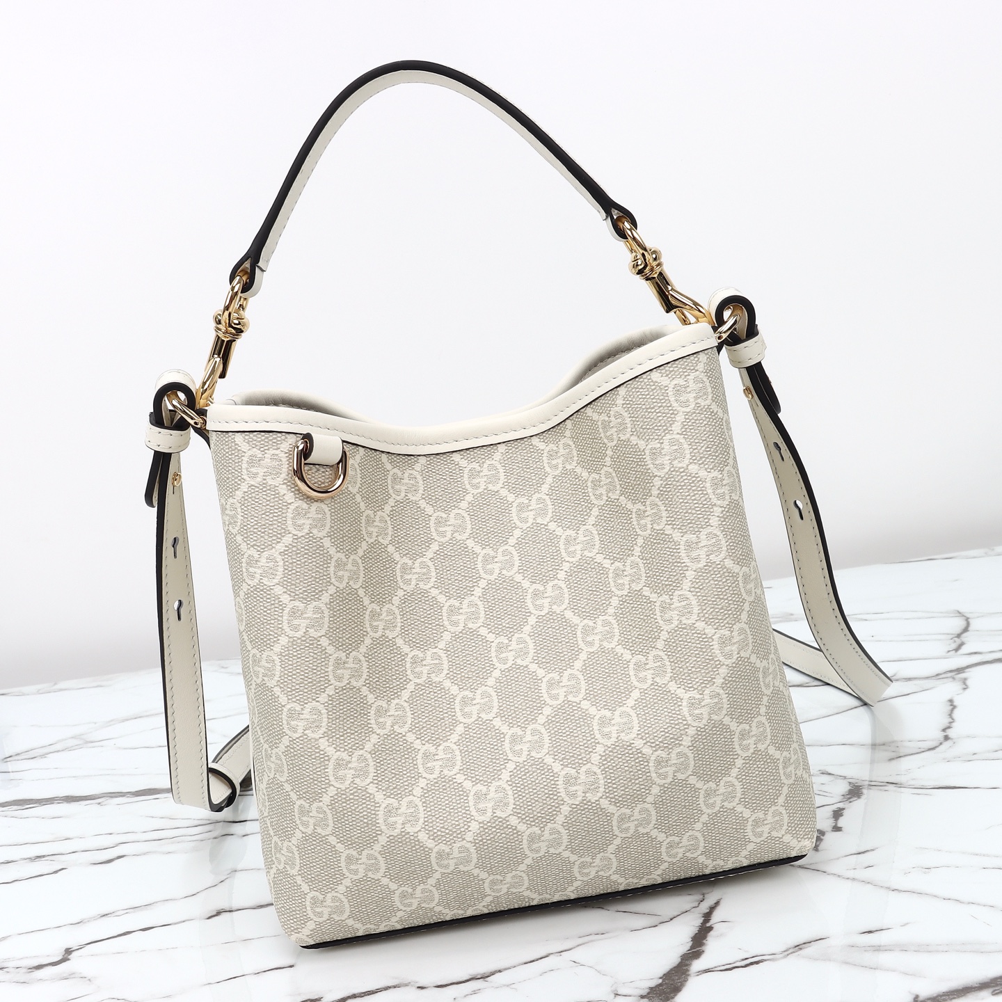 Gucci GG Emblem small bucket bag ‎815118 FAD6L 9641