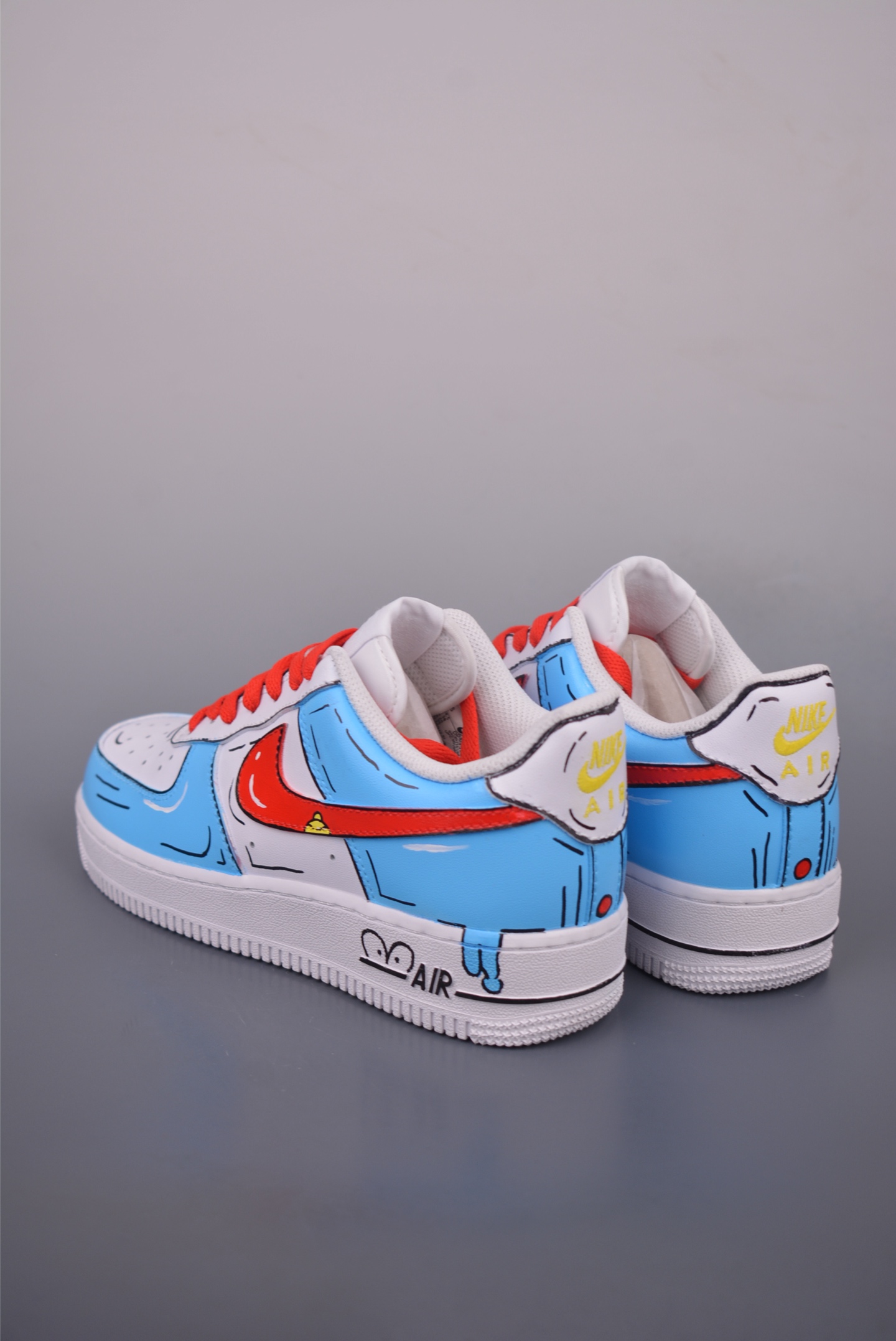 Doraemon collaboration Nike Air Force 1 Low hand-painted graffiti white, blue and red DD8959-100