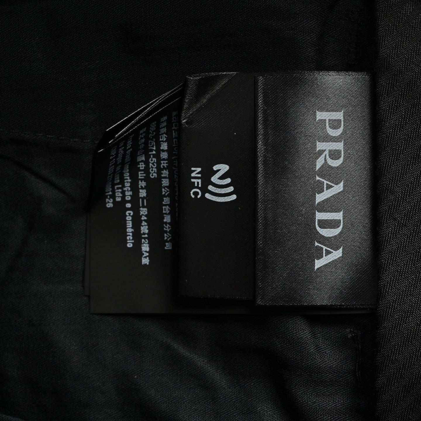 Prada 25ss stretch trousers with triangle logo on back pockets
