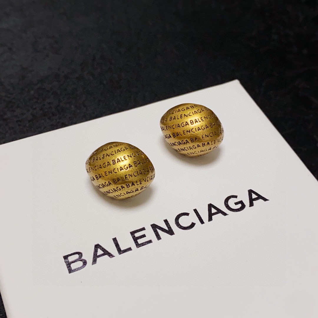 Balenciaga antique gold engraved letter earrings