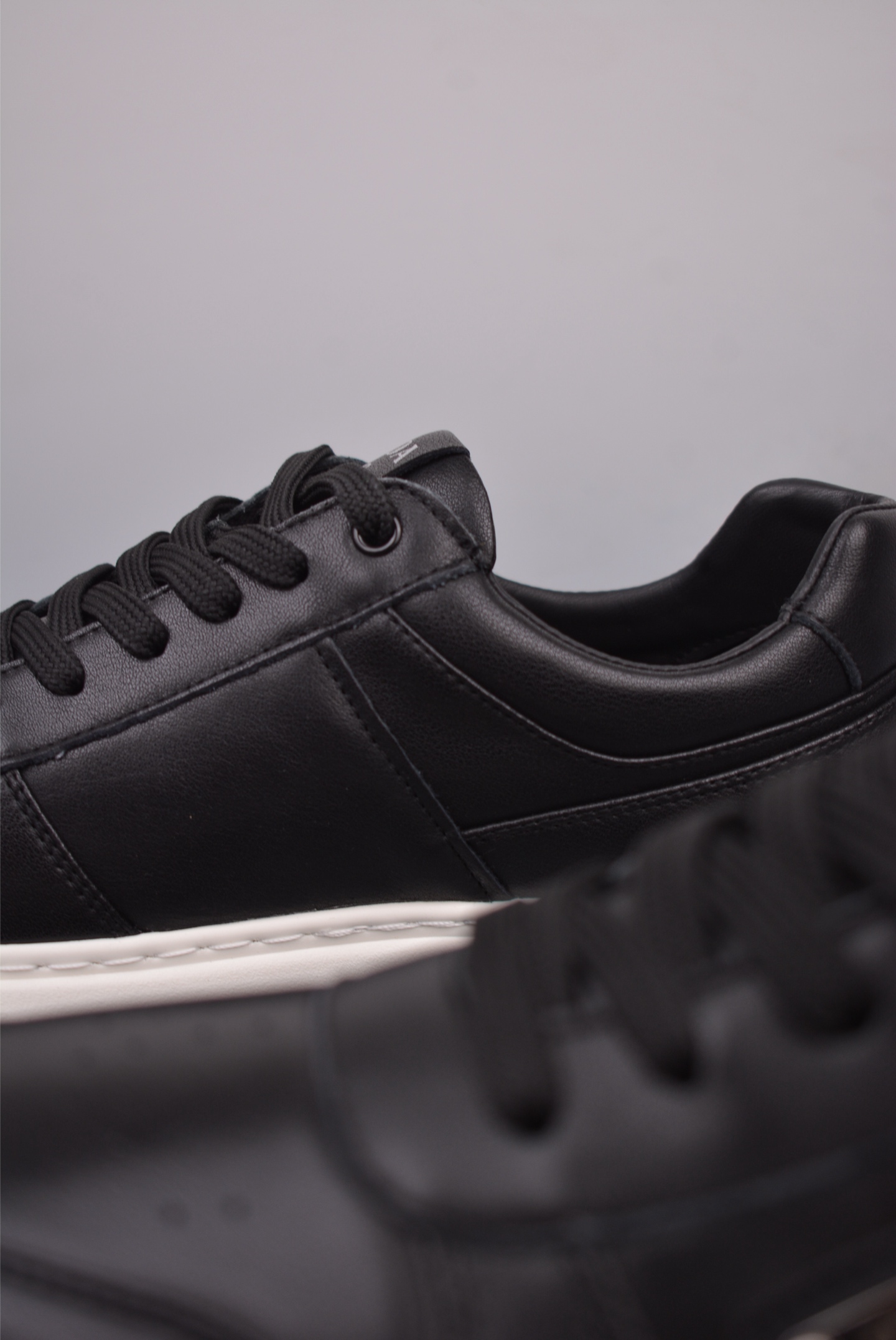 Prada PRAX 01 Triangle Logo Leather Sneakers Black and White D933M_3LF5_FG000