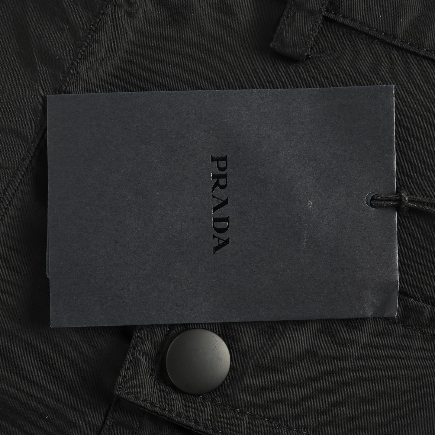 Prada 25Fw recycled nylon trousers with back flap pockets