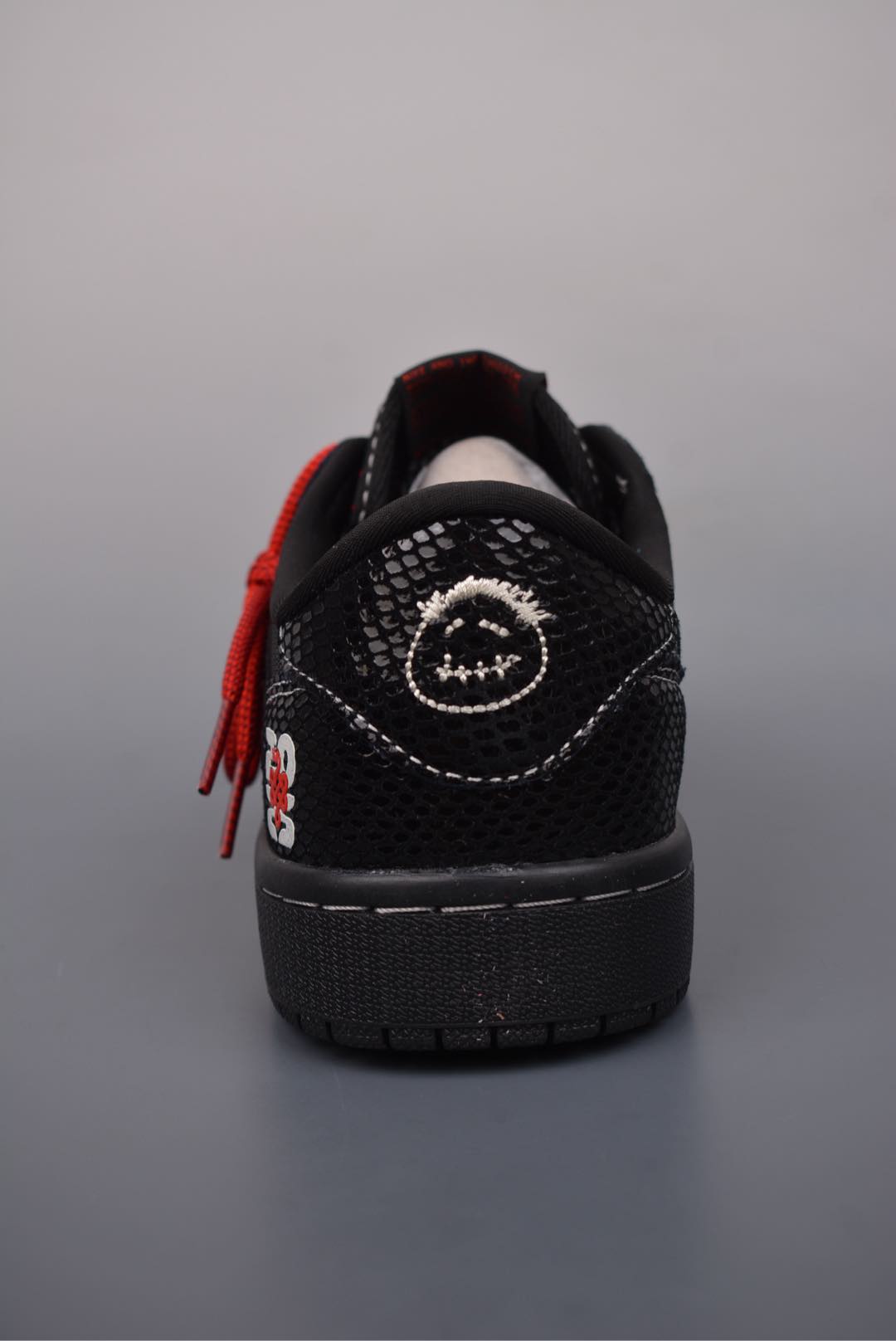 Travis Scott x Nike Air Jordan 1 Low Year of the Snake black and red CH6336-018