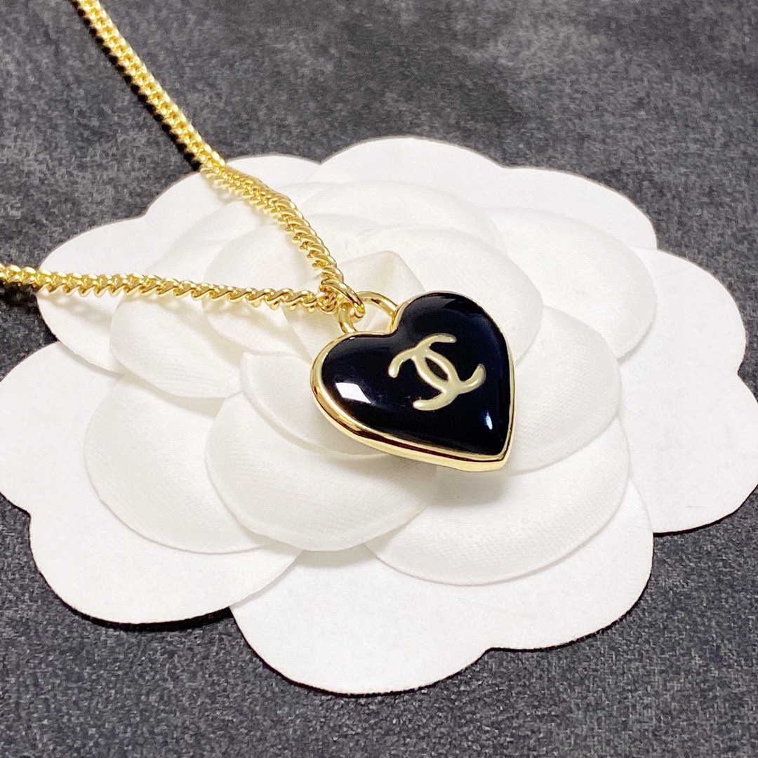 Chanel black heart double-sided necklace