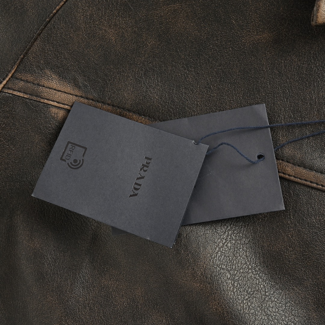 Prada 24Fw distressed leather jacket with triangle logo on back