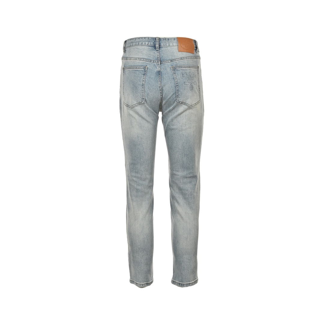 Prada washed jeans with embossed logo on back pocket