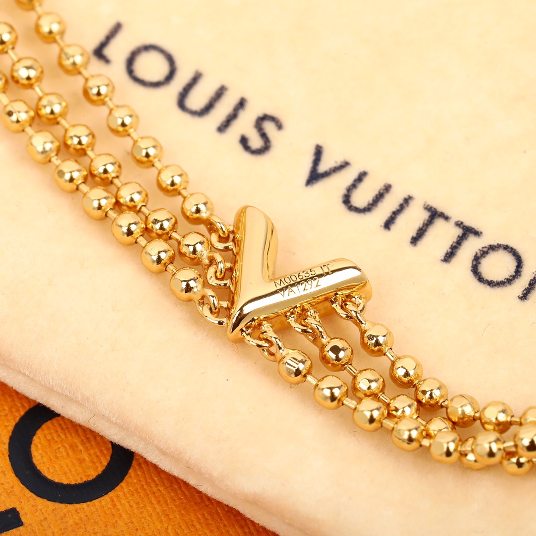 Louis Vuitton triple bead necklace