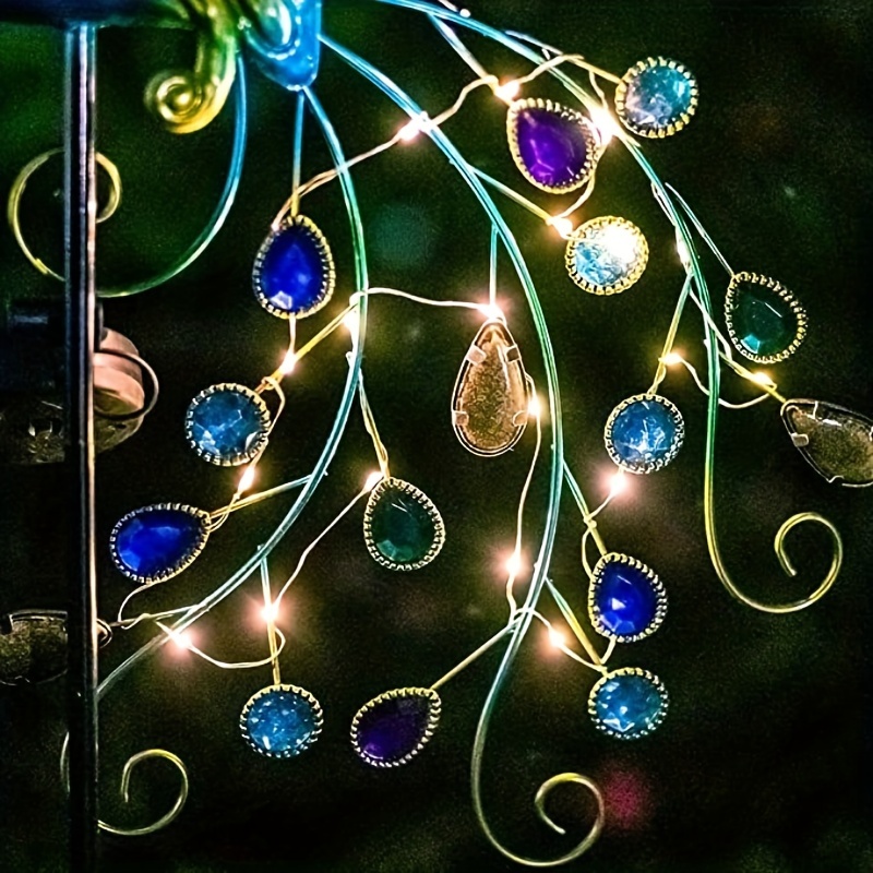 Beautify Your Garden with This Stunning Peacock Solar Garden Light - Waterproof & Durable!