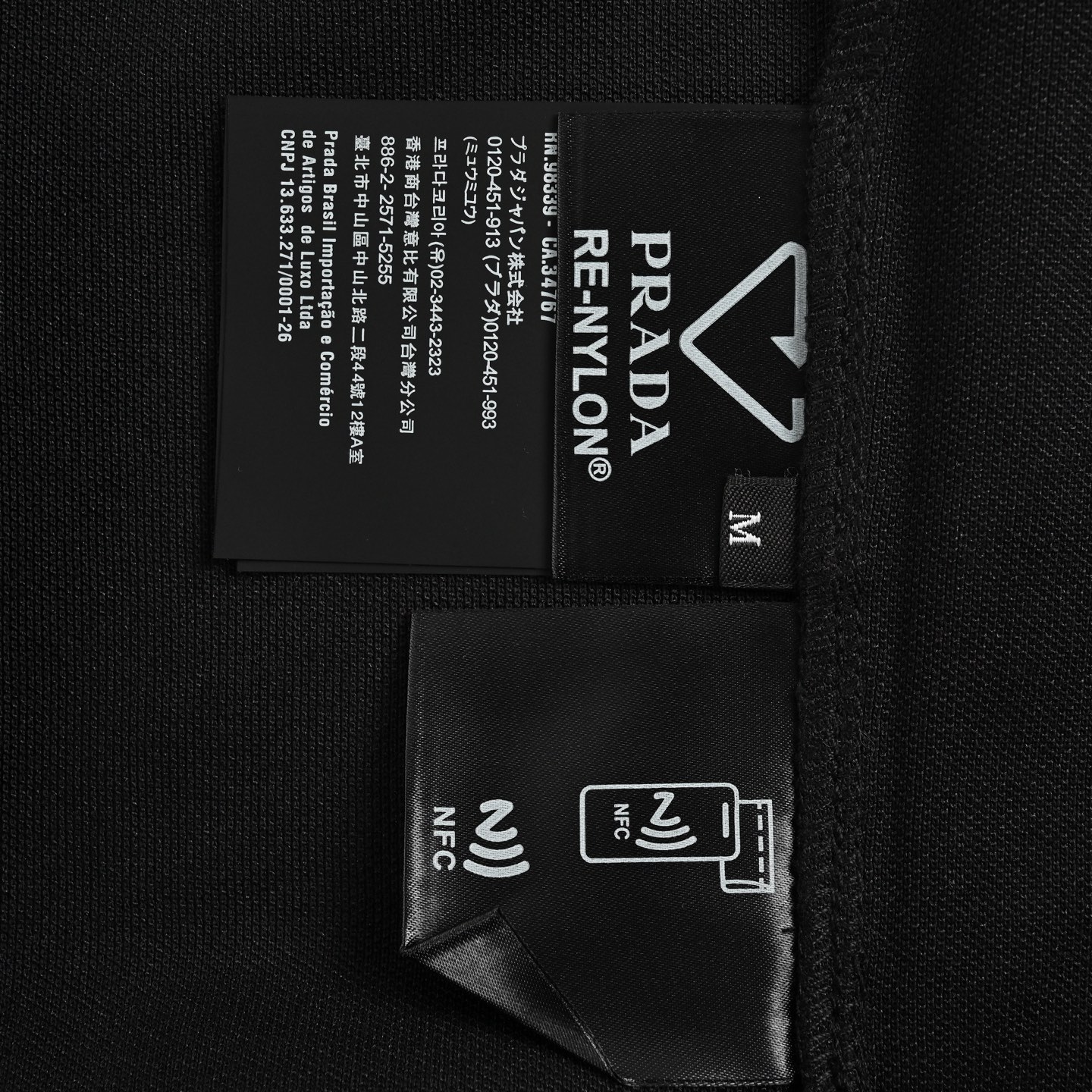 Prada 25ss triangle logo half zip polo short sleeve