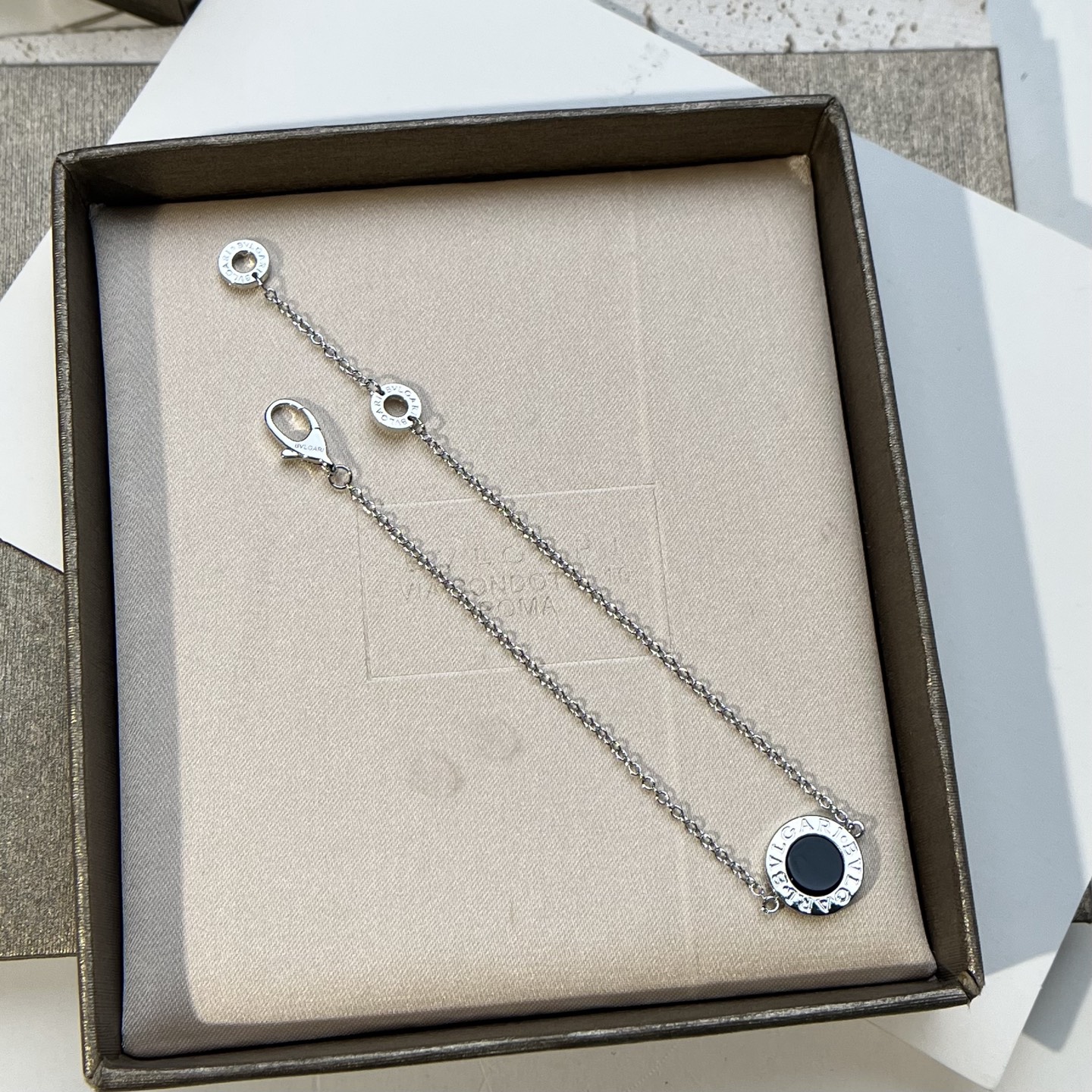 Bulgari round black agate bracelet