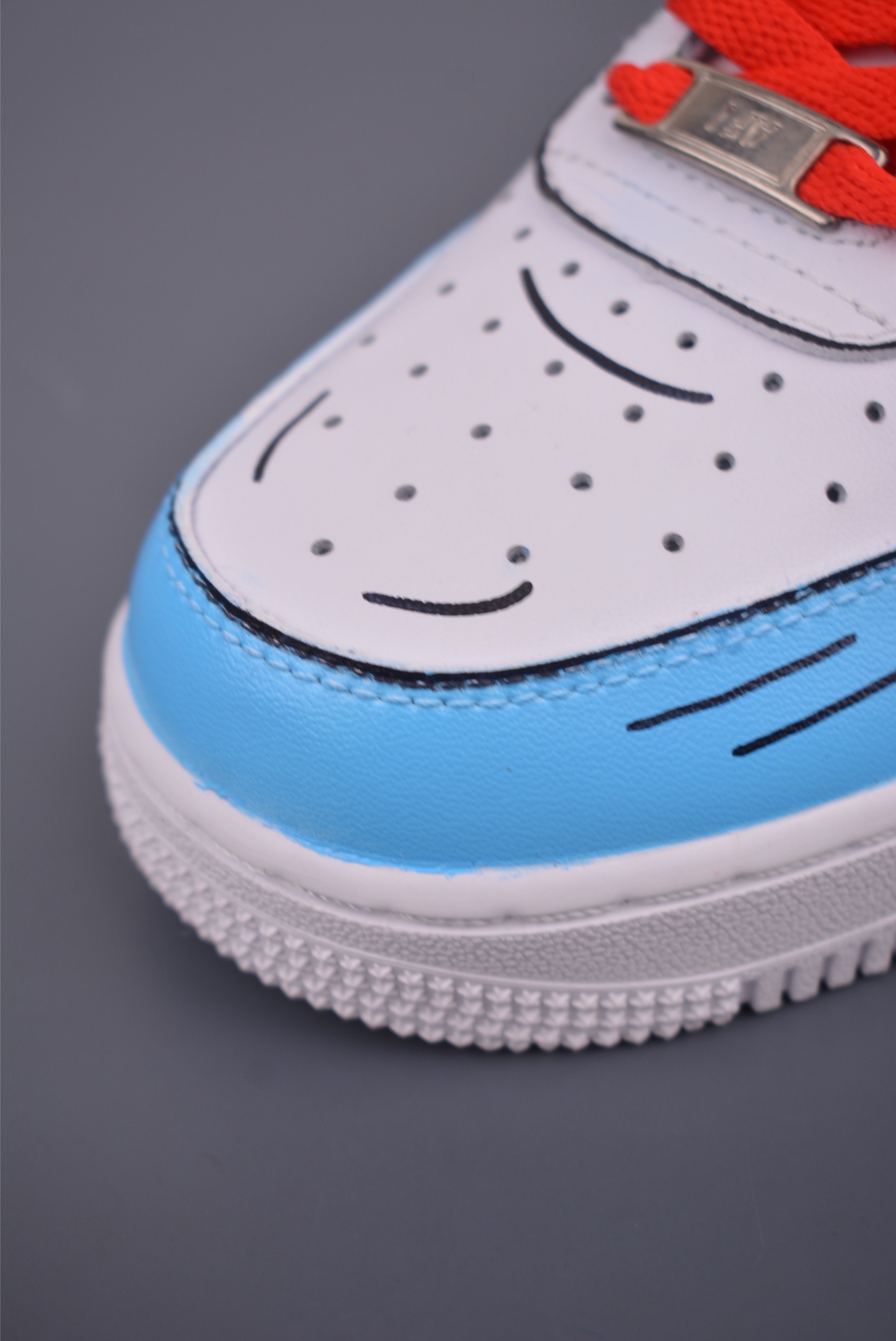 Doraemon collaboration Nike Air Force 1 Low hand-painted graffiti white, blue and red DD8959-100