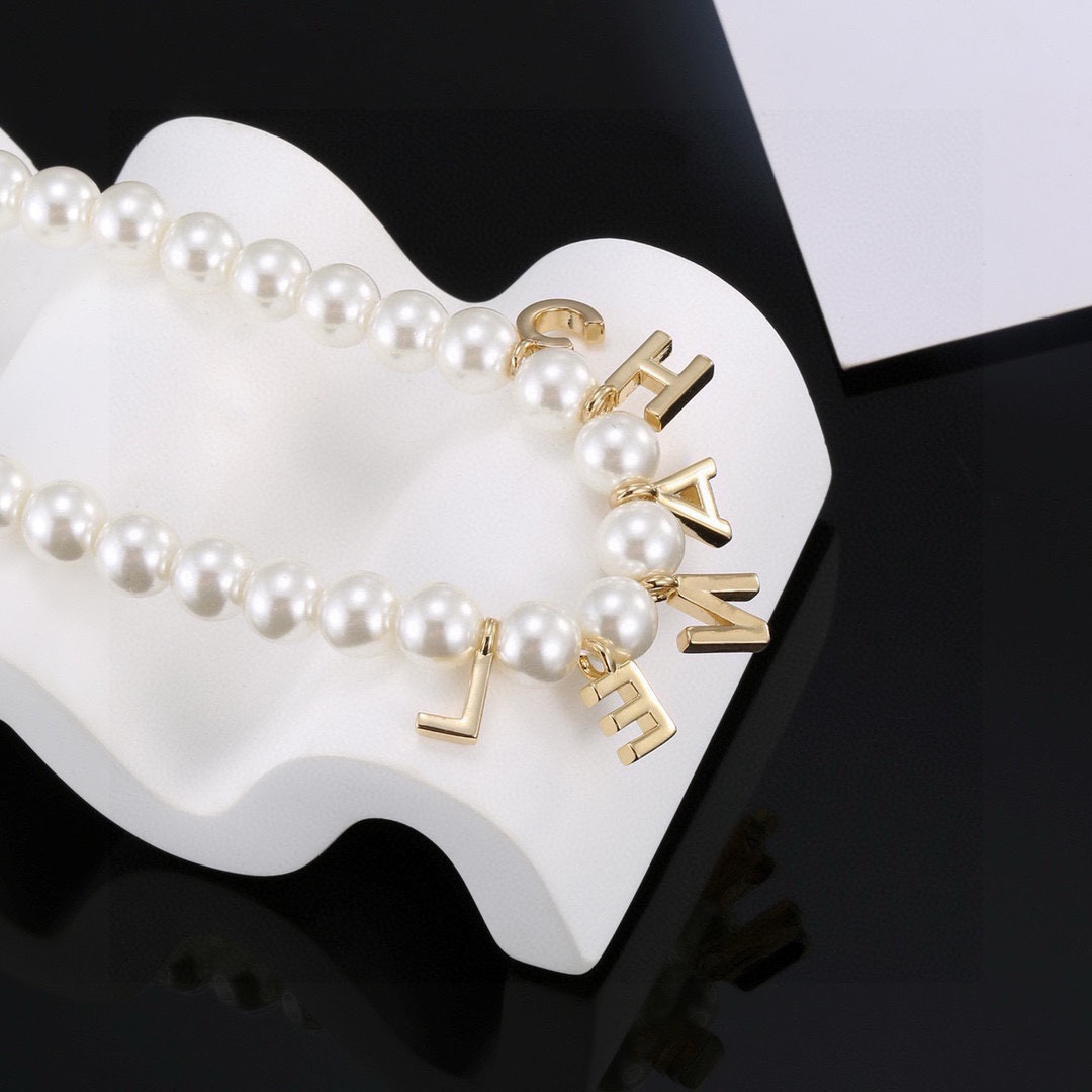 Chanel alphabet pearl necklace