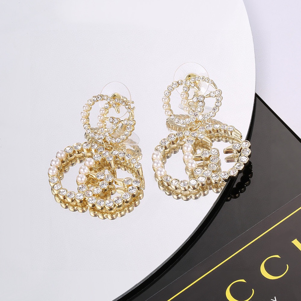 GUCCi pearl and diamond earrings