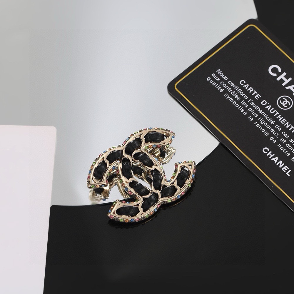 Chanel Black Leather Diamond Brooch
