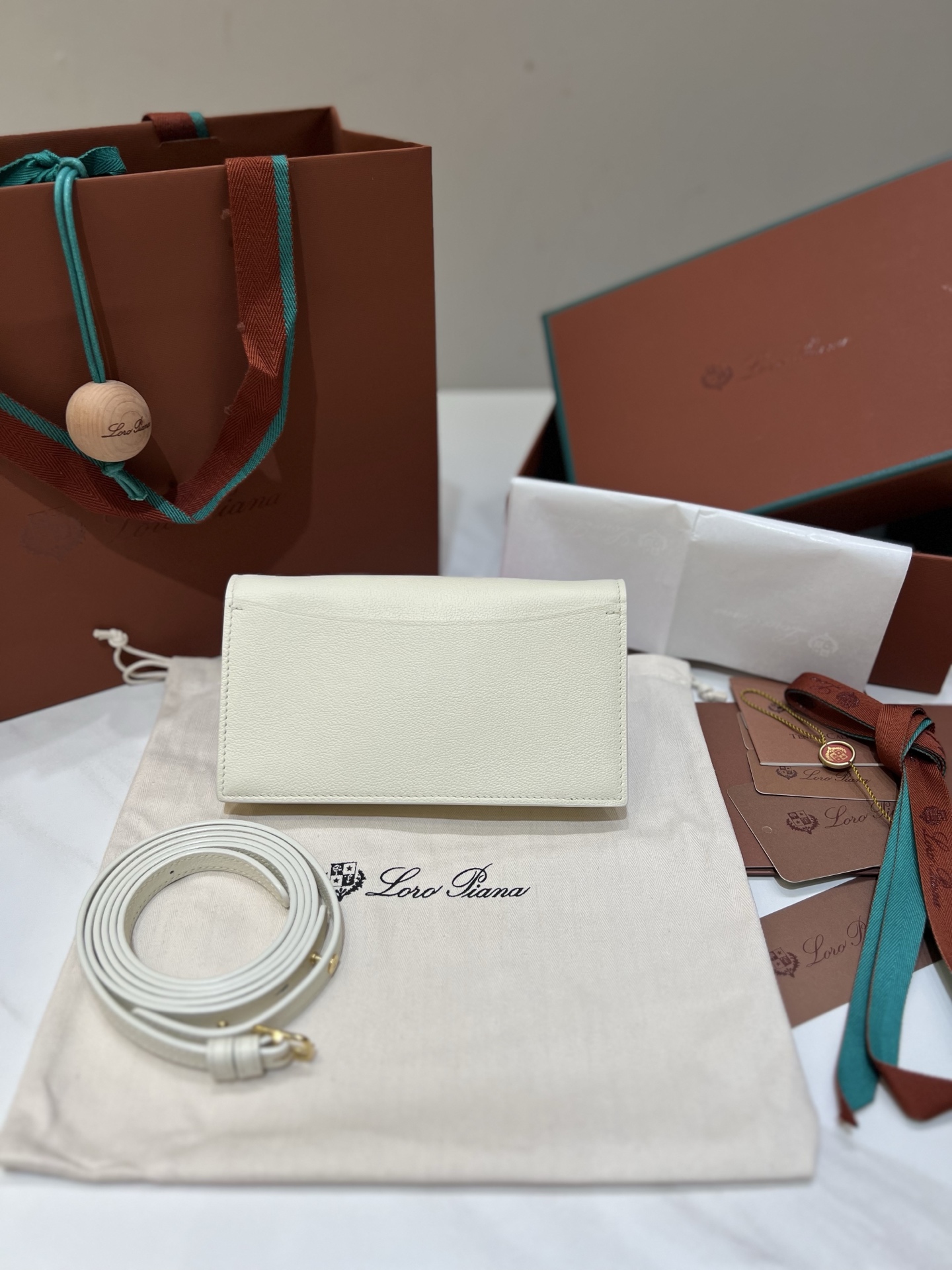 Loro Piana pochette clutch