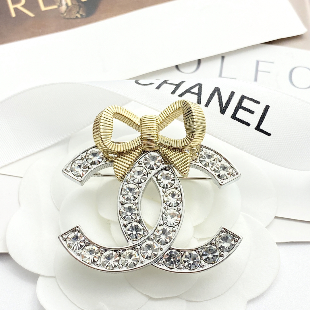 CHAN 24 gold and silver three-dimensional bow brooch