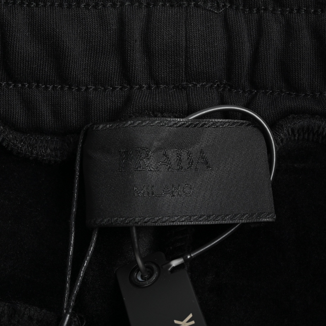 Prada 22Fw triangle logo velvet trousers