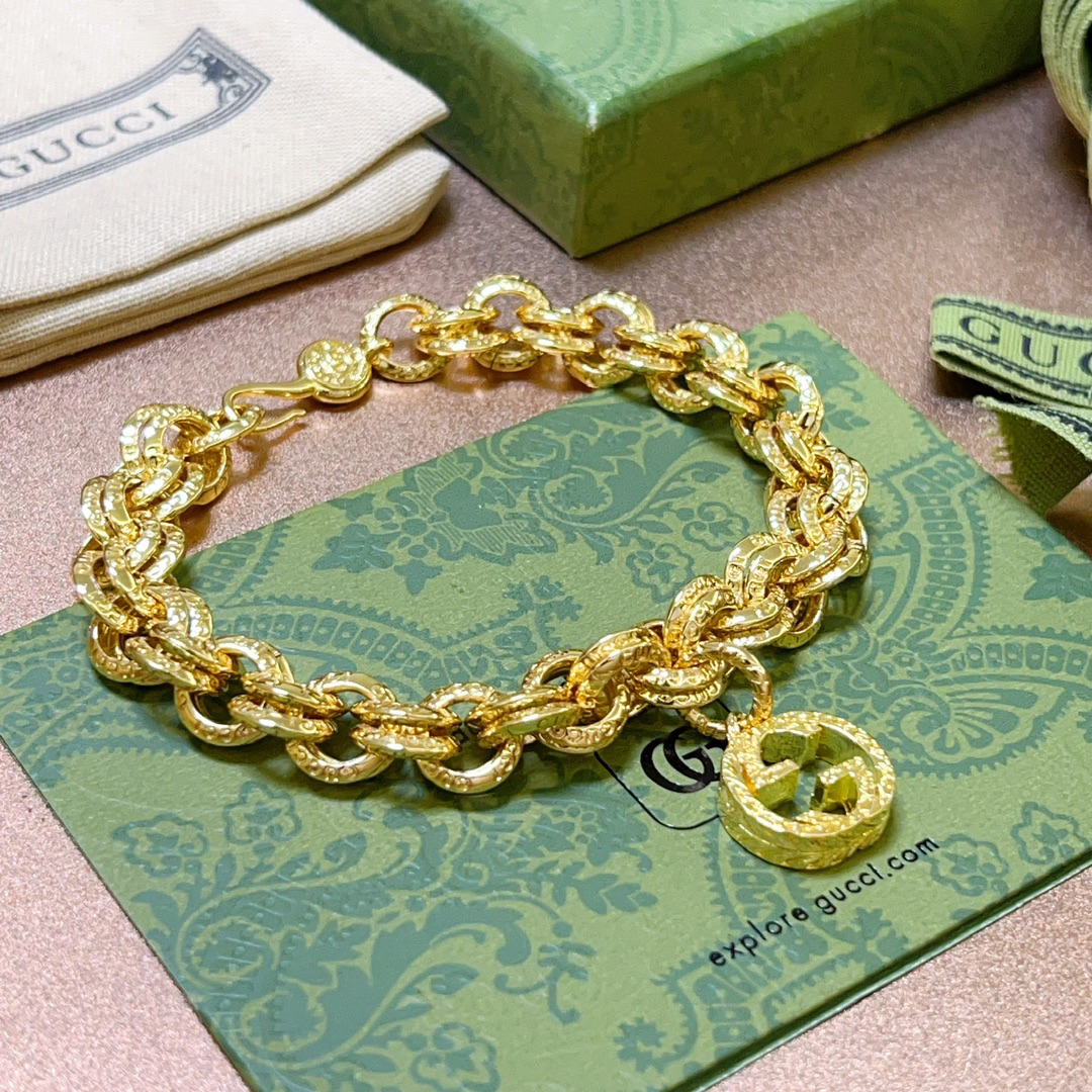 Gucci GG round double ring gold bracelet