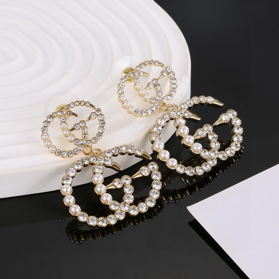 GUCCi pearl and diamond earrings