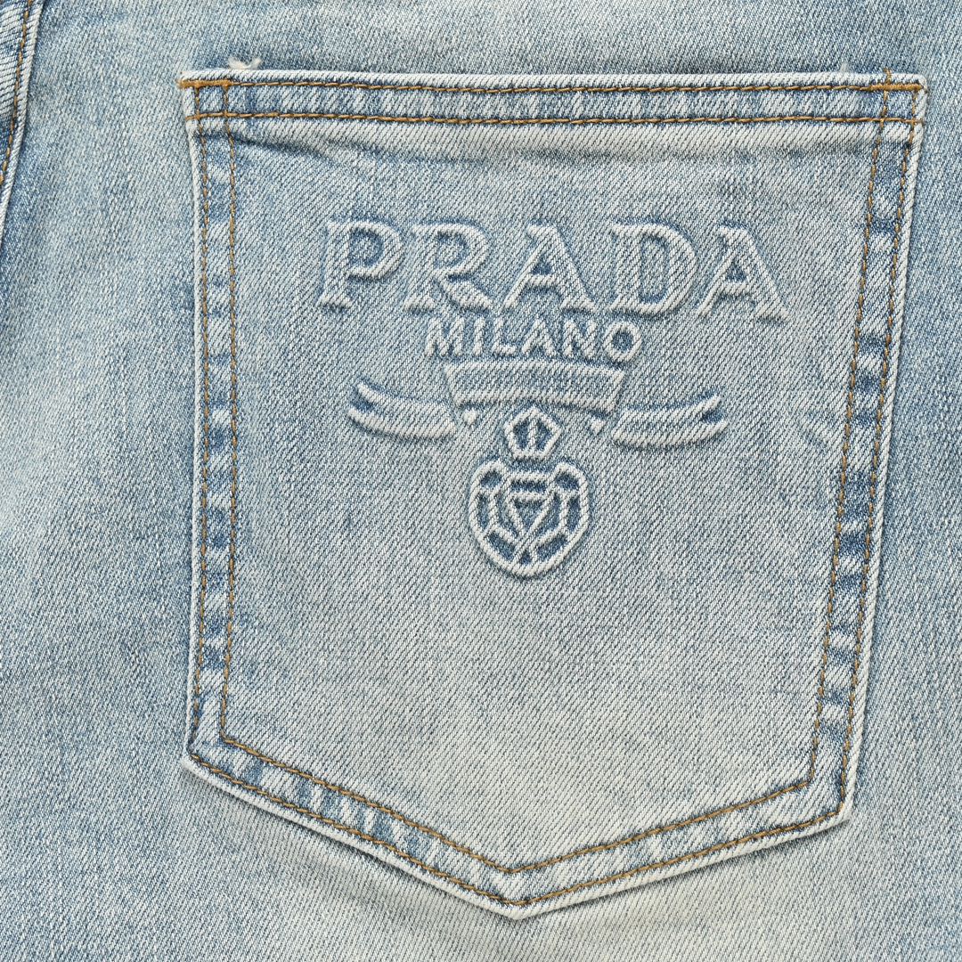 Prada washed jeans with embossed logo on back pocket