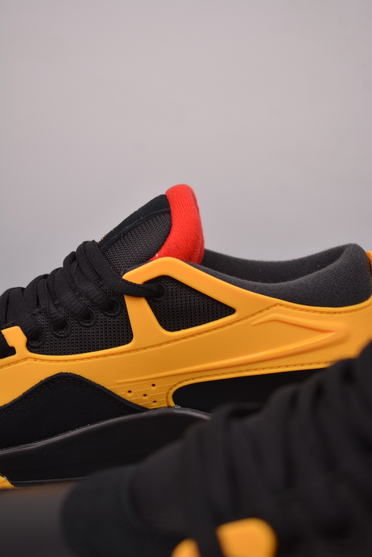 Nigel Sylvester x Jordan Air Jordan 4 RM AJ4 black and yellow FQ7939-007
