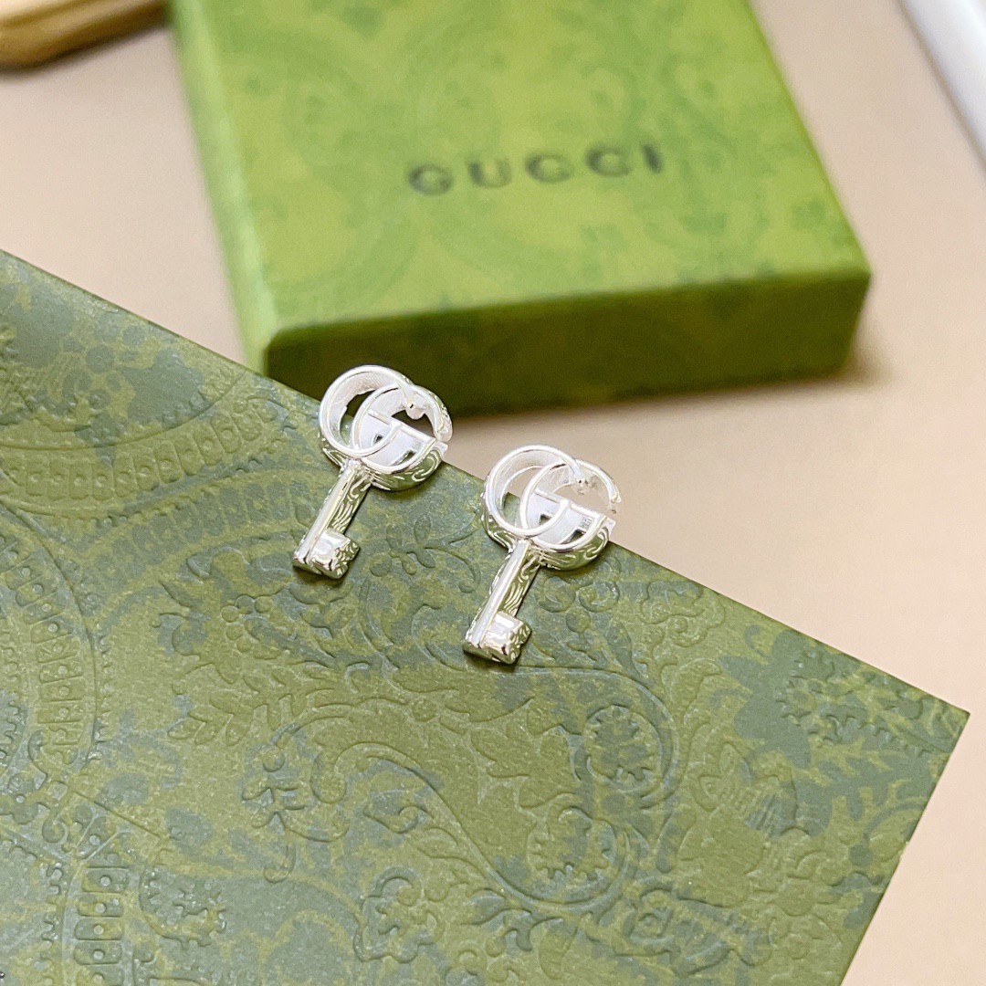 GUCCi key earrings