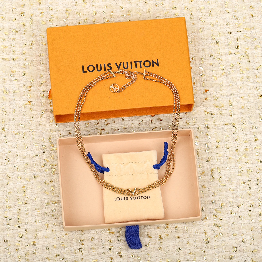 Louis Vuitton triple bead necklace