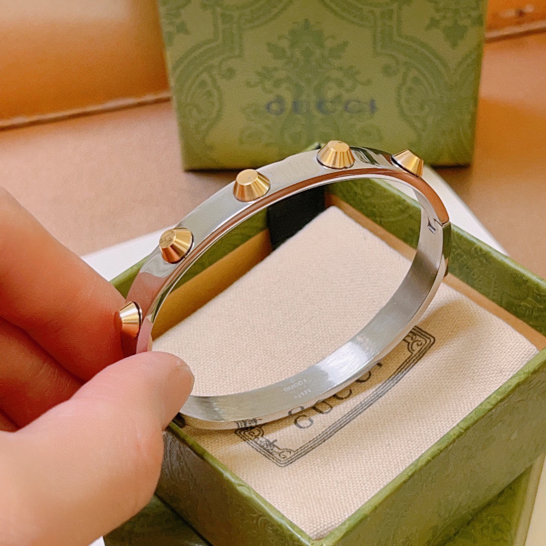 Gucci gold rivet silver bracelet
