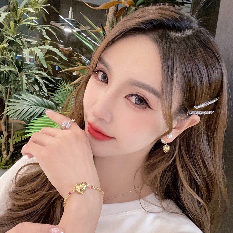 Dior embossed heart bracelet