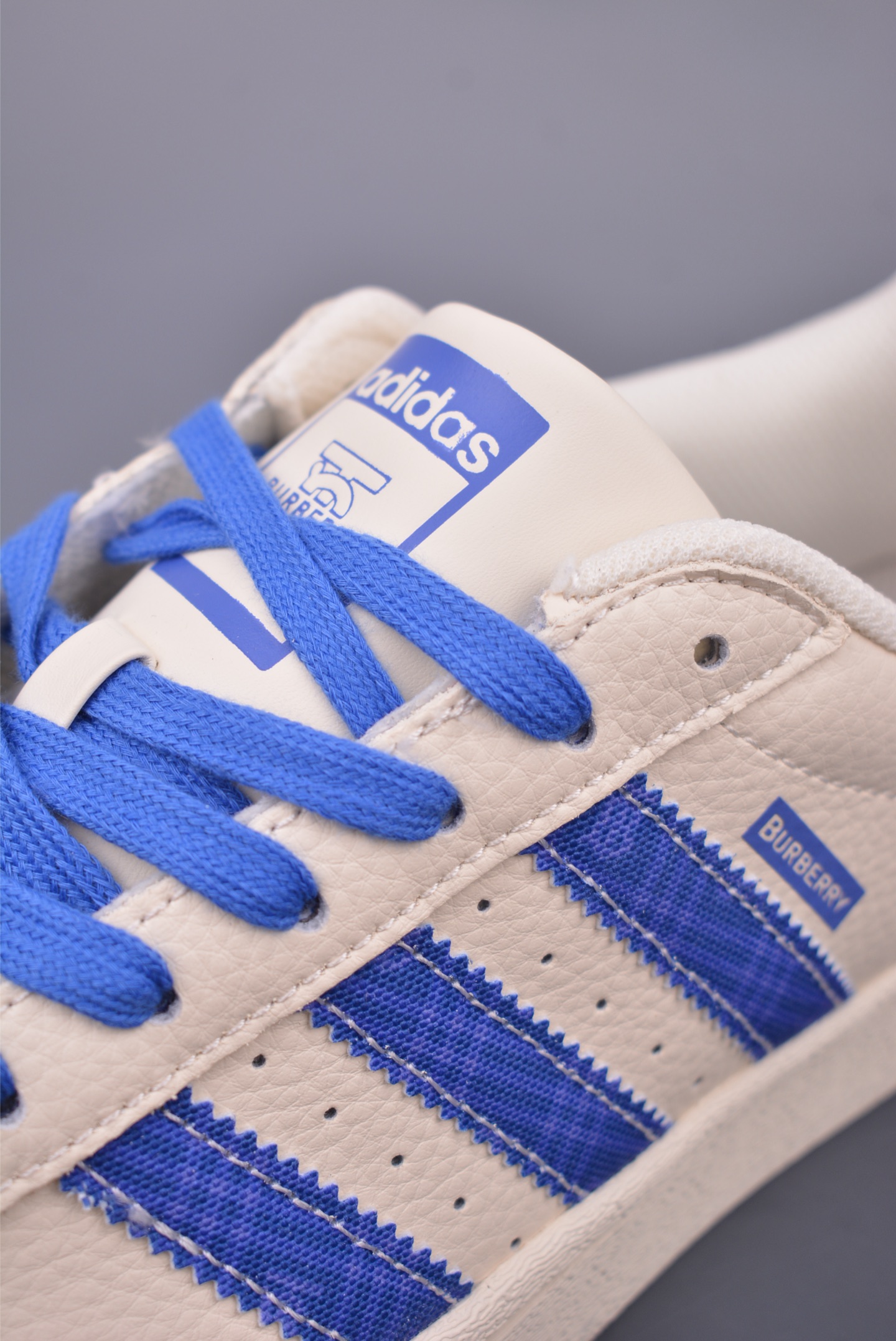 Burberry x Adidas Originals Superstar sneakers Off-white and blue AD0002