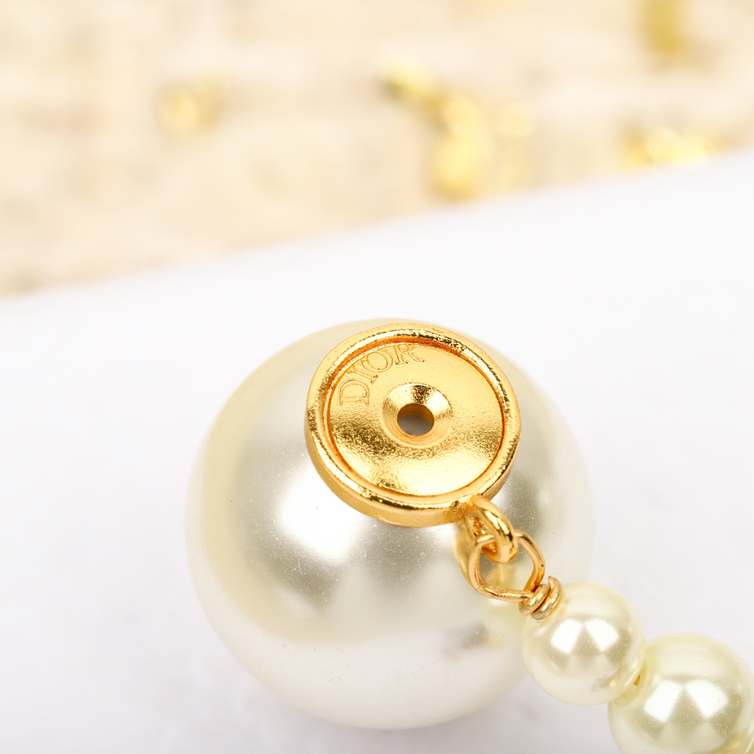 Dior Bow CD Pearl Earrings