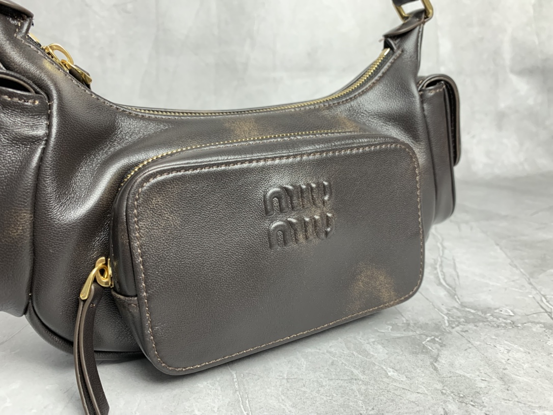 Miu Miu Multi-Pocket Biker Bag
