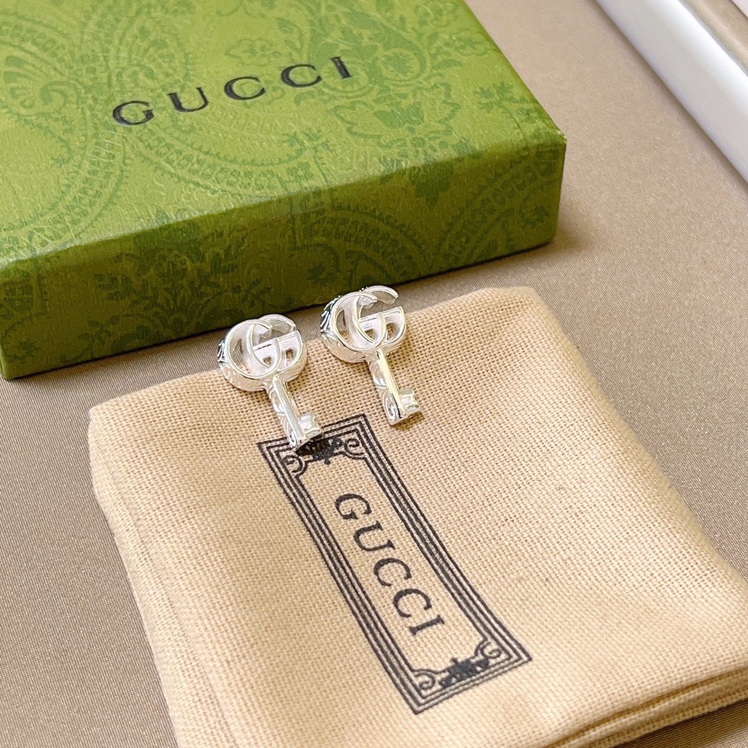 GUCCi key earrings