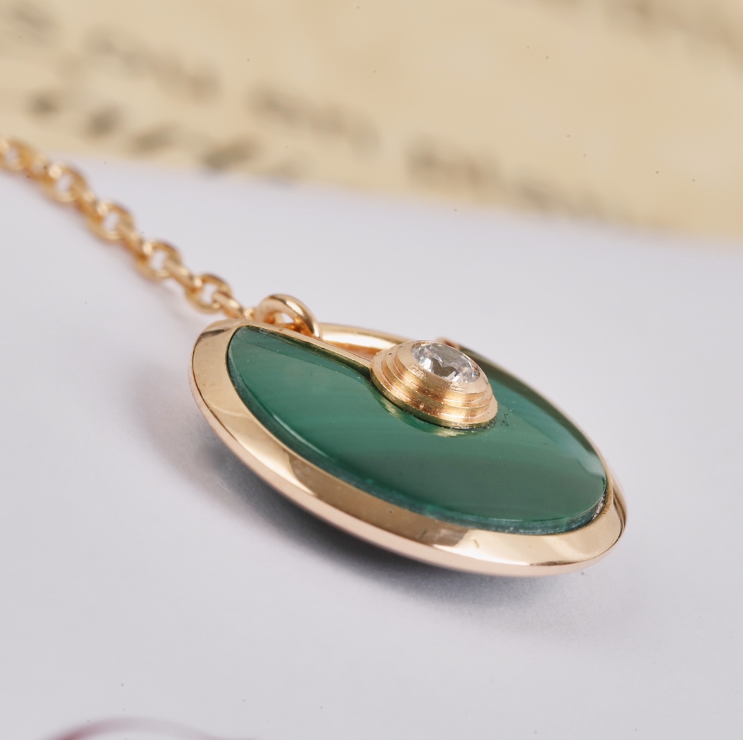 Cartier long chain amulet necklace