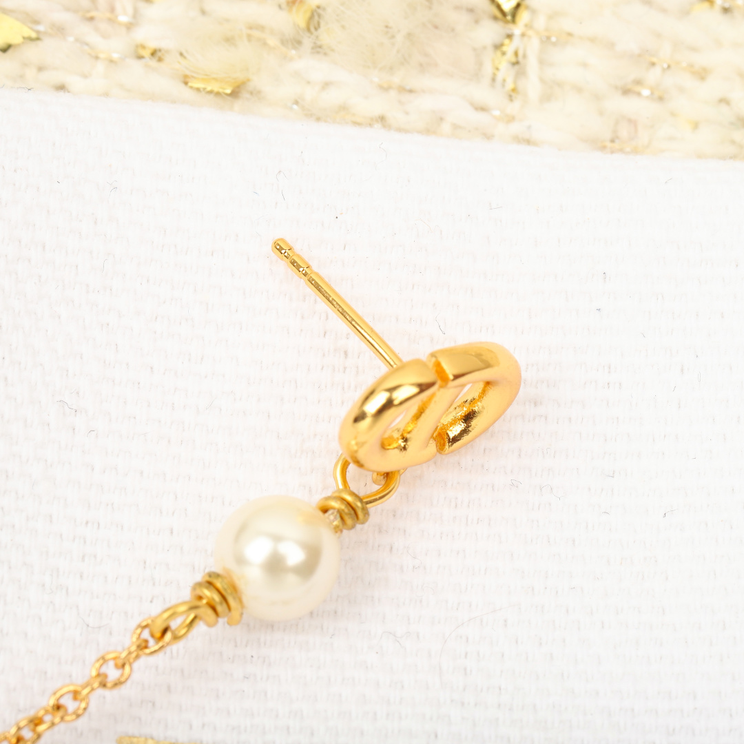 Dior large pearl earrings