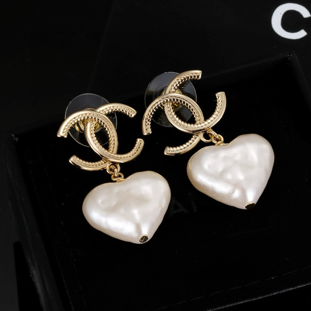 Chanel light gold heart earrings