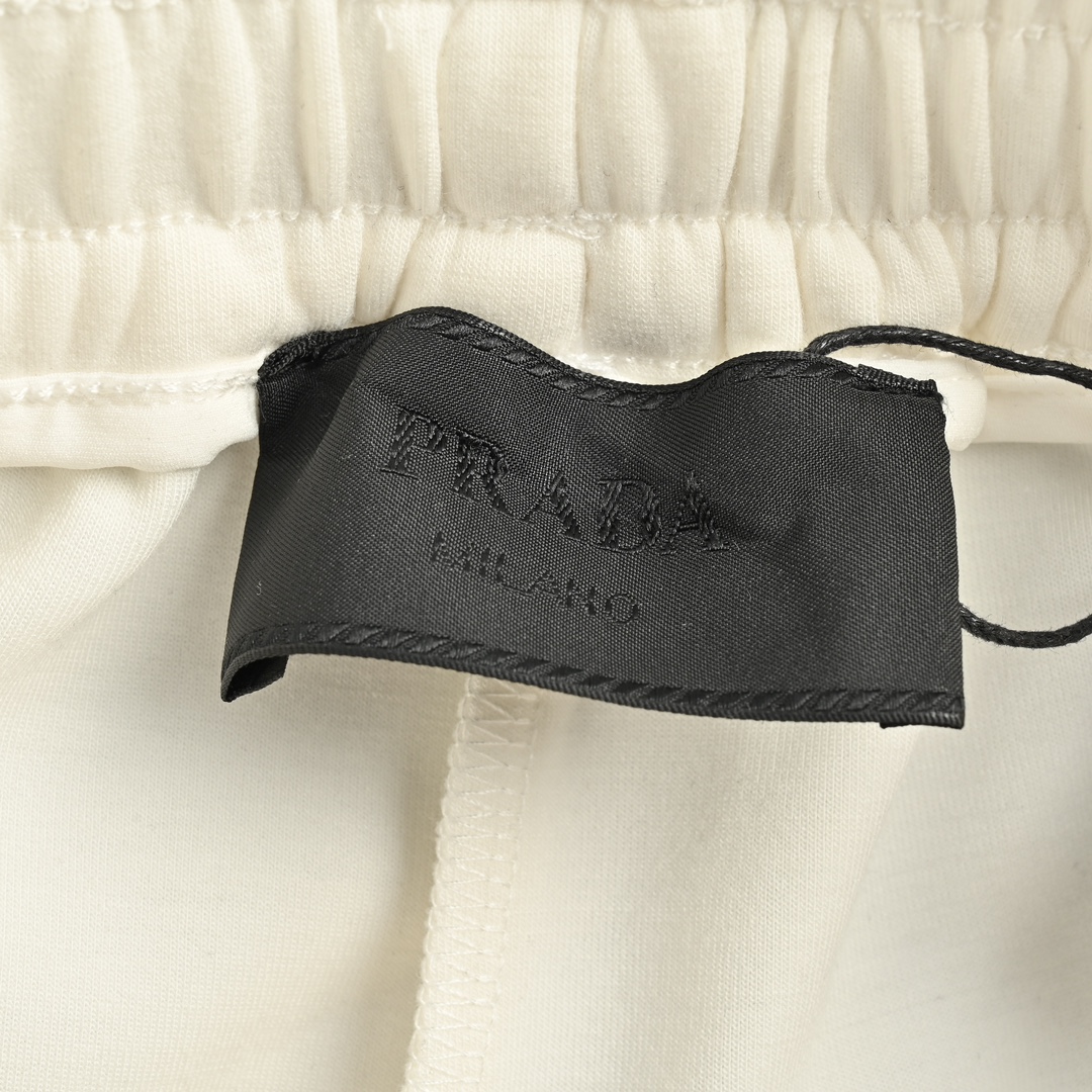 Prada Pocket triangle logo cotton cargo trousers