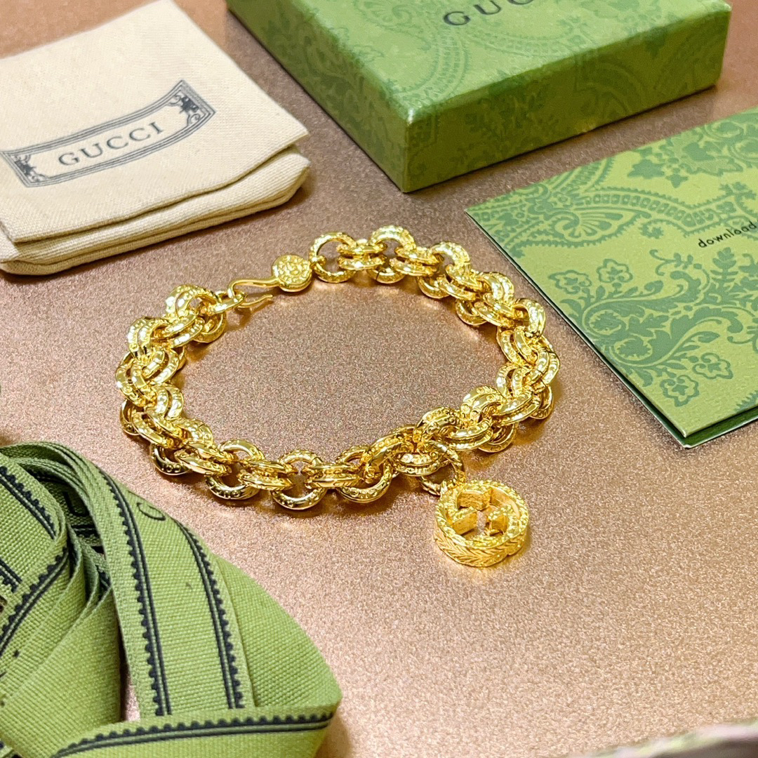 Gucci GG round double ring gold bracelet