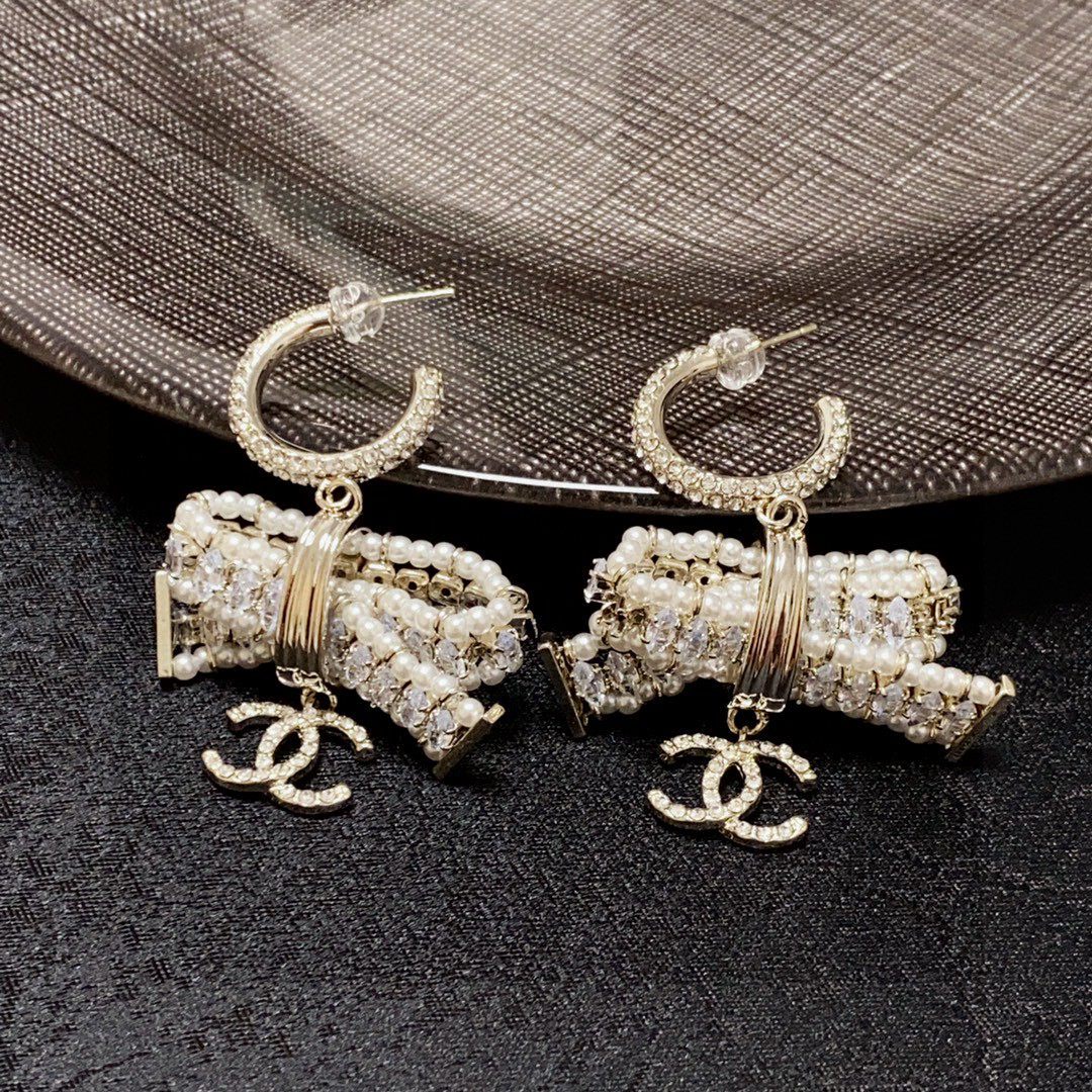 Chanel full diamond pearl bow earrings