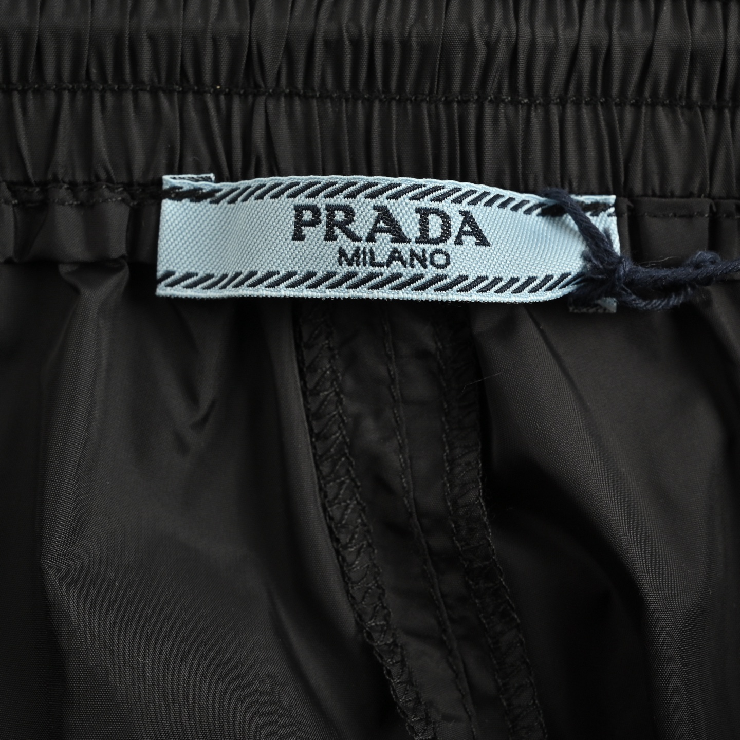 Prada 25ss printed logo nylon shorts