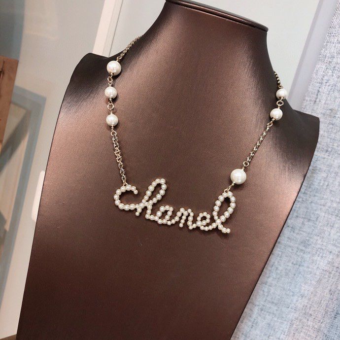 Chanel alphabet pearl necklace