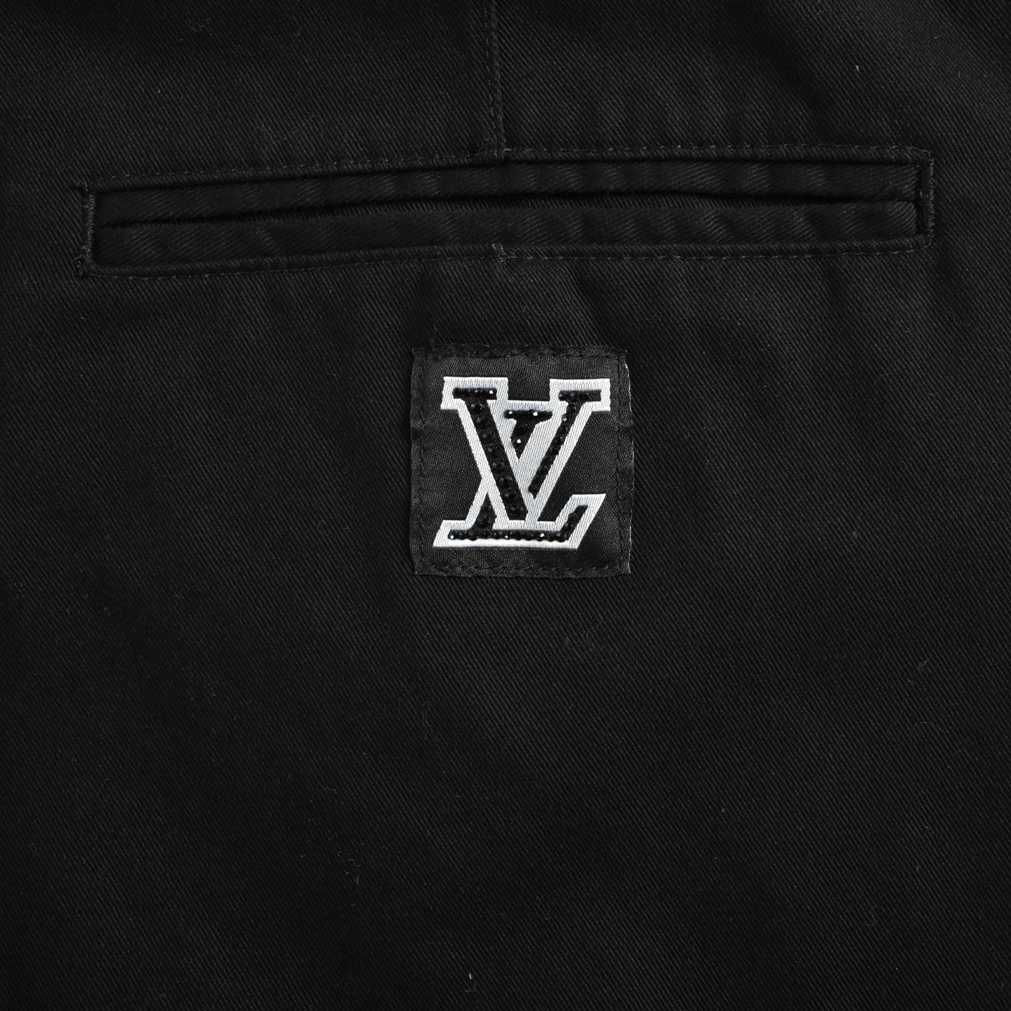 Louis Vuitton 25ss flared trousers with embroidered lettering on the back pockets